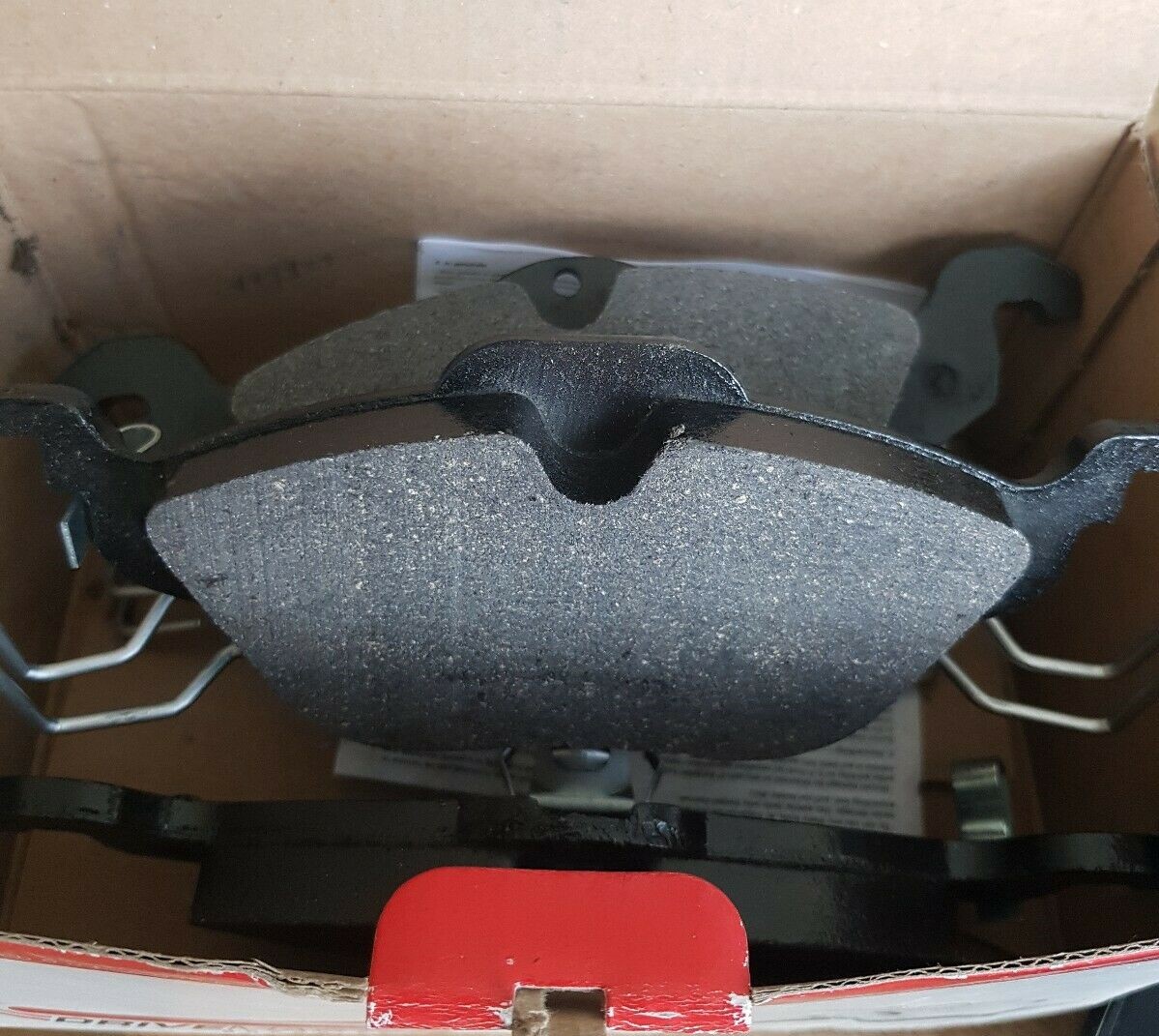 комплект передних тормозных колодок на Опель Астра Н