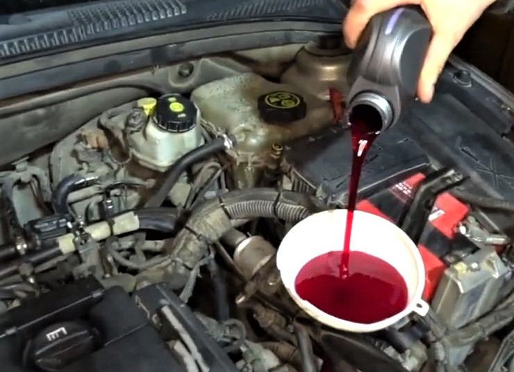 Залив масла в коробку Опель