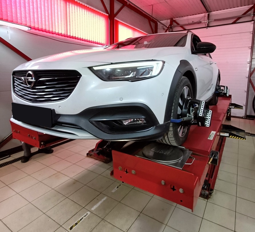 Регулировка схода-развала после замены сайлентблока рычага на Опель Инсигния