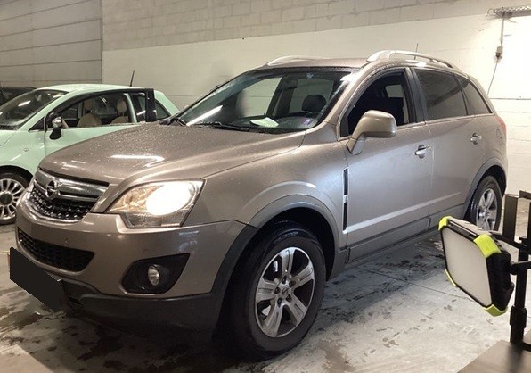 Опель Антара в автотехцентре после замены топливного фильтра