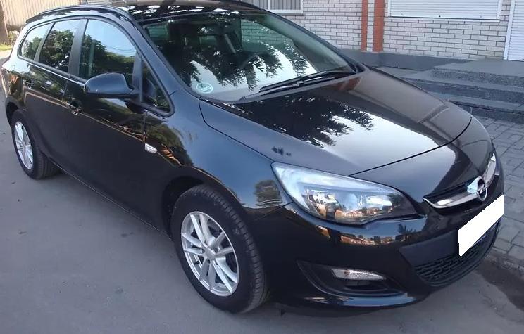 черный Опель Астра