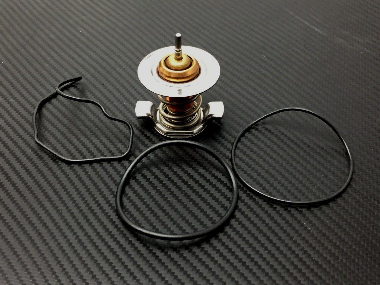 новый термостат с прокладками