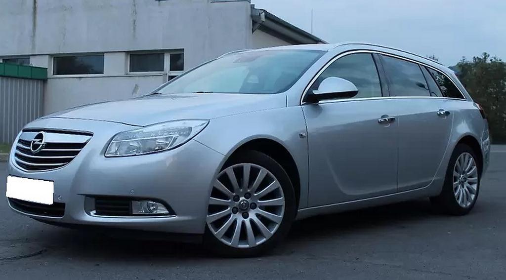 серый Опель